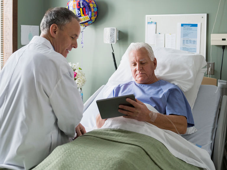Hospital patient using a tablet